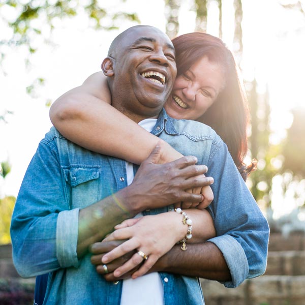 smiling middle aged couple