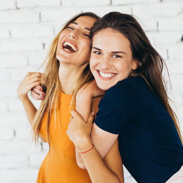 two friends laughing